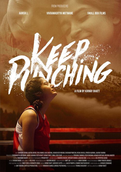 movie poster showing Kirnay (Samridhi Dewan) kneelling in a boxing ring, her face turned up and struck with emotion, her eyes closed. In background is a shot of her snuggling with her girlfriend Kaveri (Astha Arora). The words “Keep Punching” and “A film by Kirnay Bhatt” are overlayed, as well as many additional movie credits in type too small to read.