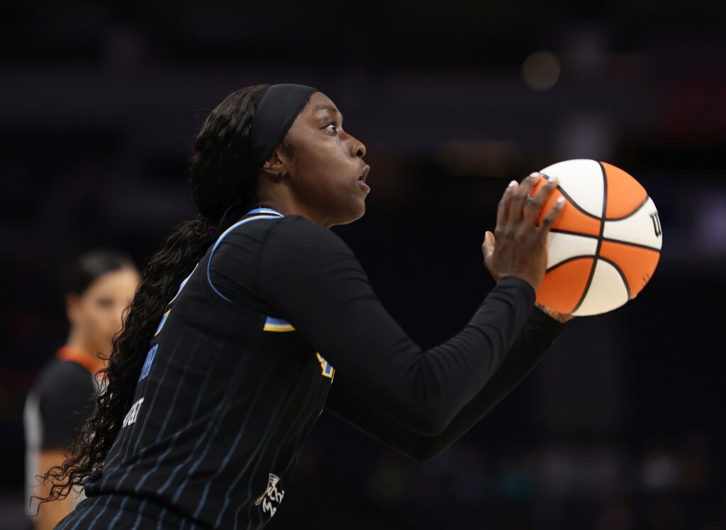 A shot in profile of Kahleah Copper taking a free throw
